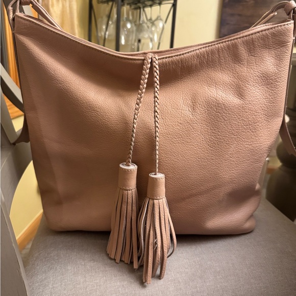 margot Handbags - Margot pink blush tone leather shoulder bag with tassels and details!